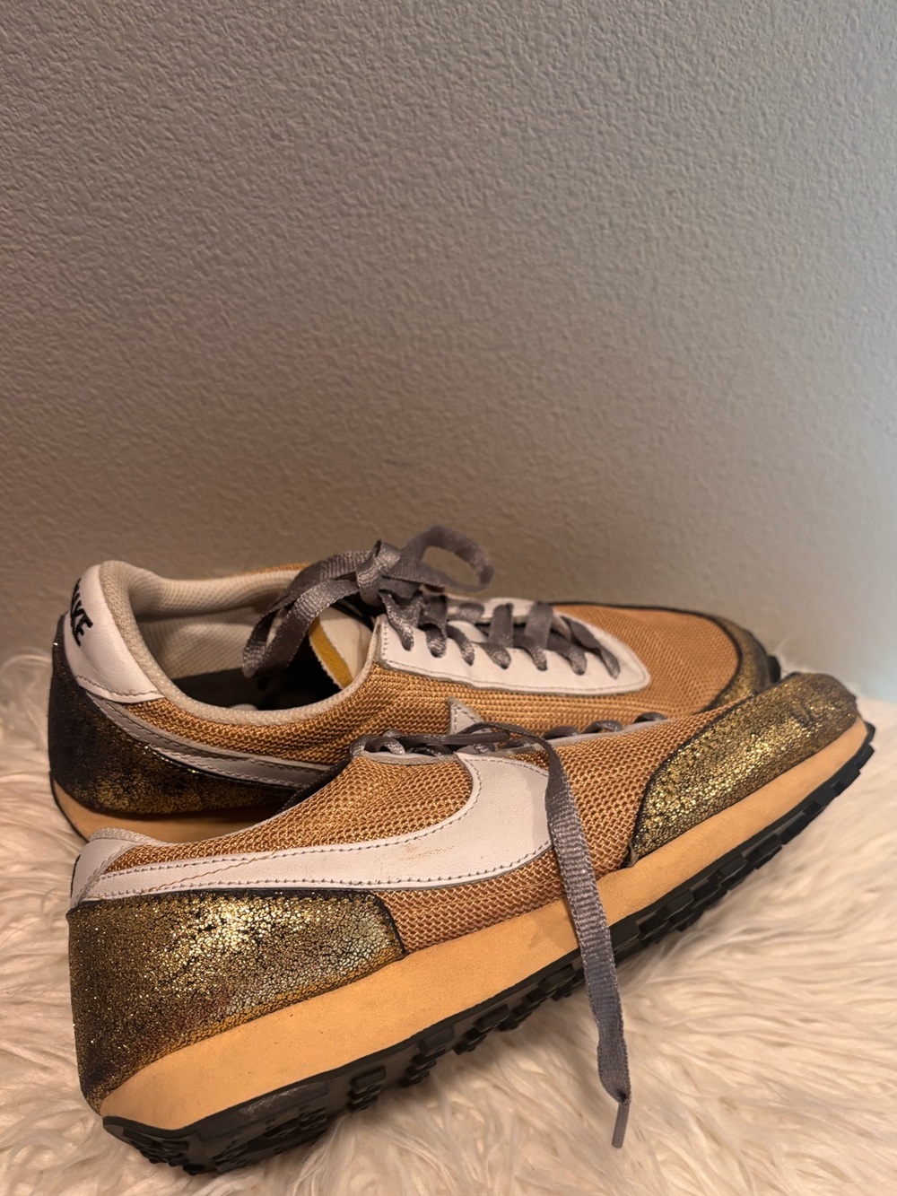 Nike Women’s Metallic Gold Mesh Sneakers